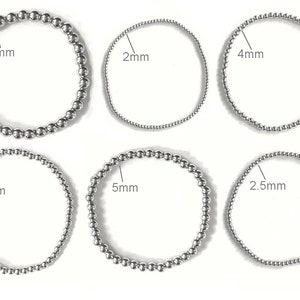 Bracelets perles élastiques acier inoxydable dorés / argentés femme image 7