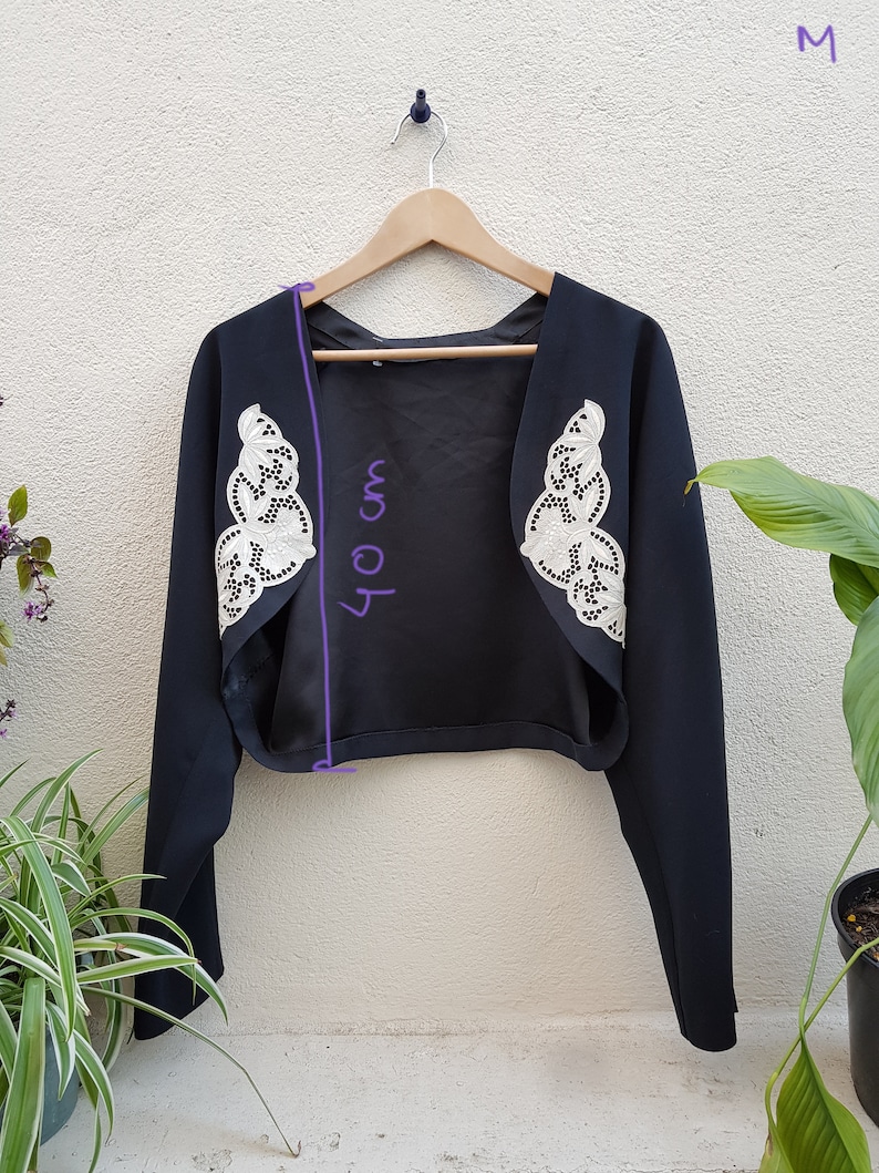 Black and white vintage jacket with guipure lace jacket style and open vest cut spencer