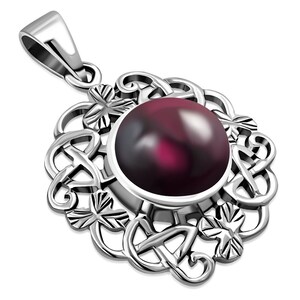 May include: A silver pendant featuring a dark purple gemstone set within a Celtic knot design.