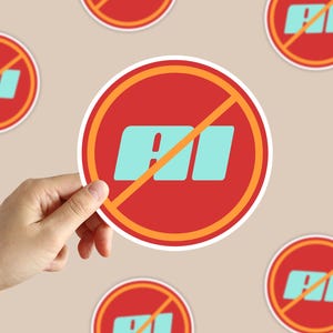 May include: A circular sticker featuring a red background with a bright orange border. The center displays the light blue text AI crossed out by a diagonal orange line. The design is repeated multiple times across the visual field.