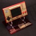 Jeremy Anderson reviewed Nintendo Game&Watch Super Mario Bros 35th 2020 HXA-001 Acrylic Handheld Console Display Stand