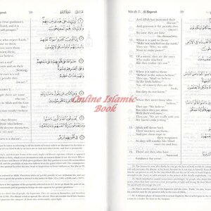 May include: Open book with Arabic text and English translation. The pages display verses from the Quran, with the title "Surah 2: Al Baqarah" at the top. The text is in black, with some annotations and the "Online Islamic Book" logo.