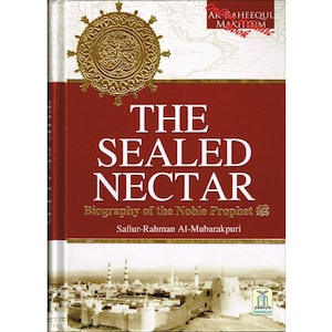May include: A hardback book titled "The Sealed Nectar" with a burgundy cover and gold detailing. The title is in large white letters, with the subtitle "Biography of the Noble Prophet" below. The book features a gold emblem and a city illustration.