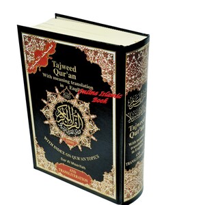 May include: A hardcover book titled "Tajweed Qur'an" with English translation. The book has a black cover with gold and red decorative patterns and text. The spine also features text. The book is for Islamic studies.