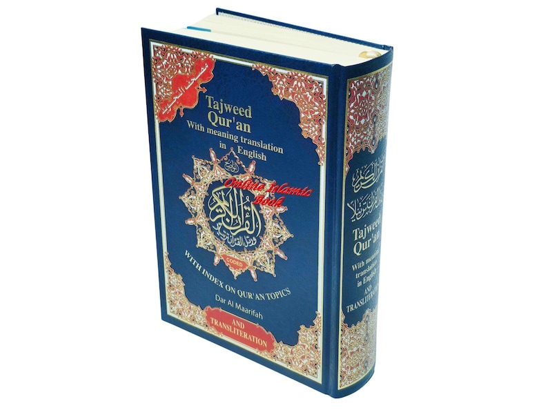 May include: A hardcover book titled "Tajweed Qur'an" with English translation. The cover is navy blue with gold and red decorative accents. The book includes an index on Qur'an topics and transliteration.
