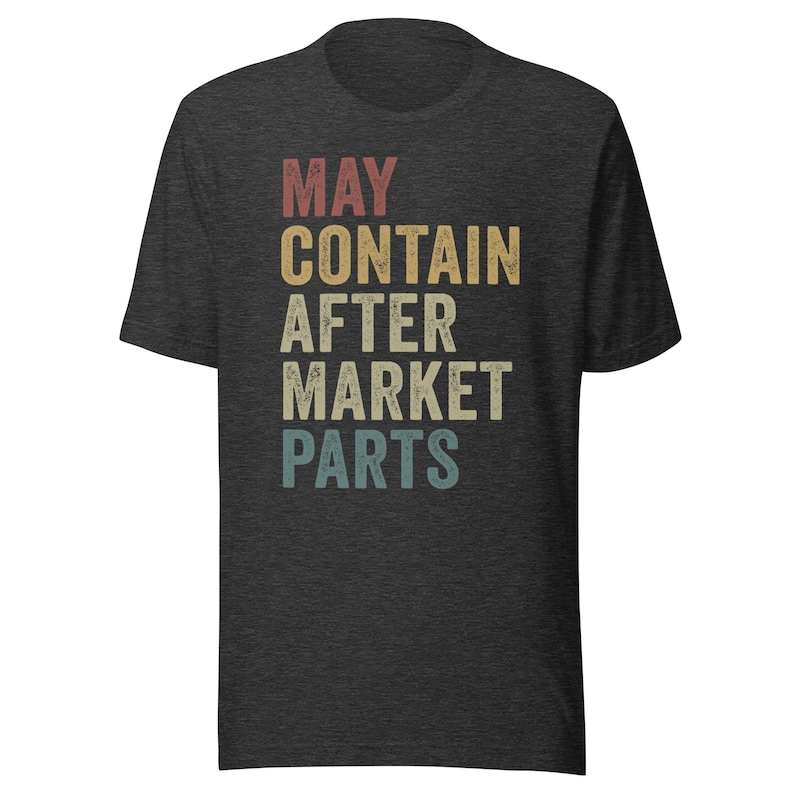 May include: A dark heather grey t-shirt with a vintage-style graphic that reads "MAY CONTAIN AFTER MARKET PARTS".