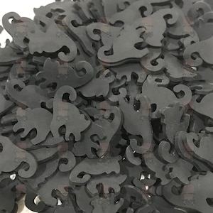 May include: A large pile of black cat-shaped cutouts. The cutouts are made of a thick, rubbery material and are perfect for crafting projects.