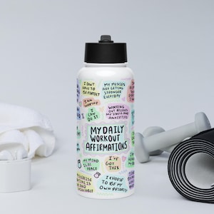 Stainless steel water bottle with a straw lid