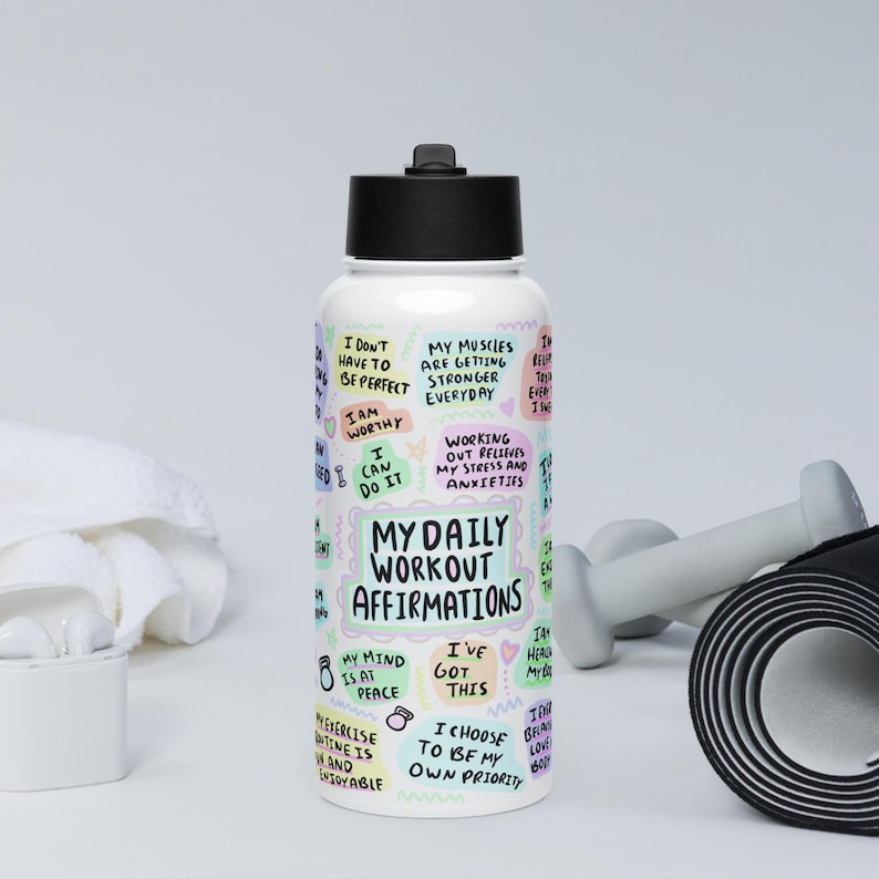 Stainless steel water bottle with a straw lid