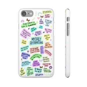 May include: A white iPhone case with a colorful design featuring positive affirmations and motivational quotes. The text includes phrases like "The pain I feel is temporary", "I am unique", "My daily affirmations", "I am loved", "I am worthy of love", and "I am growing every day".