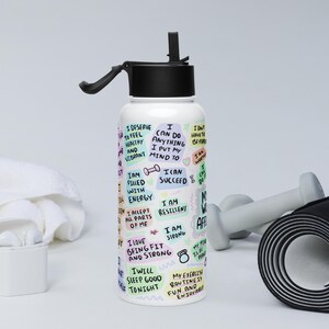 Stainless steel water bottle with a straw lid