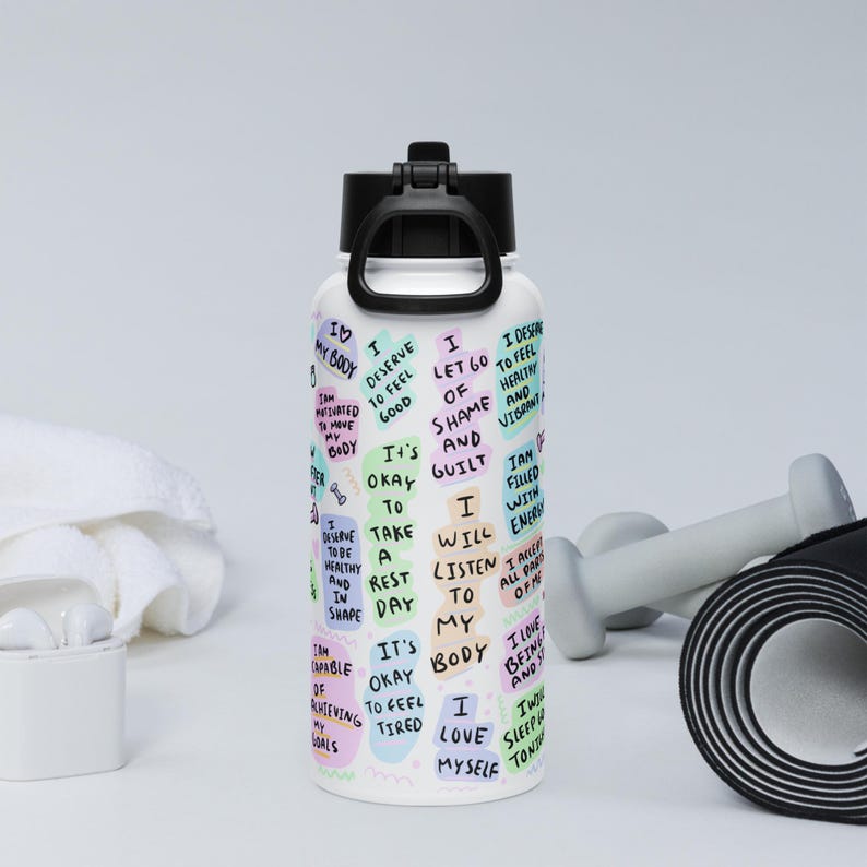 Stainless steel water bottle with a straw lid