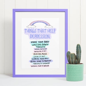 Może przedstawiać: Wydruk w ramie z tęczą i tekstem "Things that help depression" po kt&oacute;rym następuje lista czynności, w tym "Move your body", "Writing down thoughts", "Going outside", "Snuggling a pet", "Playing music", "Crying it out", "Cleaning your space", "Being kind to yourself", "Taking a shower" i "Going for a drive".