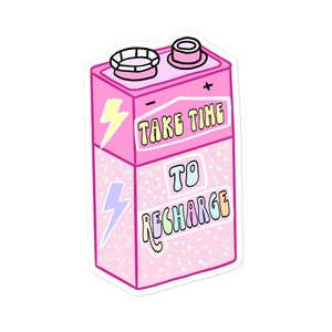 May include: Pink battery sticker with a white outline and a sparkle pattern. The sticker says "Take time to recharge" in rainbow colors.