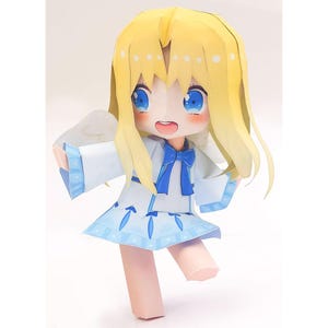 May include: A papercraft angel figurine with long yellow hair, blue eyes, and a light blue and white outfit. The angel has small wings and a bow tie. The figurine is standing with one leg slightly raised.