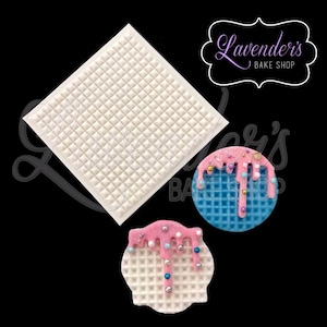 May include: A white silicone mould with a square waffle pattern. Two examples of the waffle pattern are shown, one with pink and blue icing and sprinkles, and the other with pink icing and sprinkles.