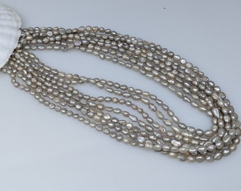 Irradiated Stacked Chinese Freshwater 4 x 6 mm rice Krispies pearl keshi strand