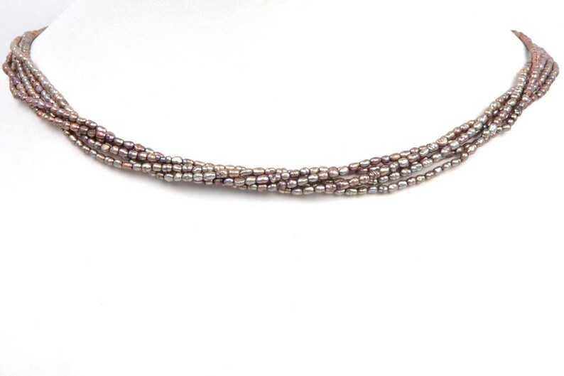Dyed Chinese freshwater banded rice pearls