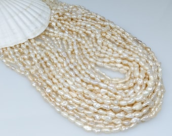 Cream Chinese freshwater Rice Krispy pearls 4.0-4.0 by 10.0-10.5mm pearl strand