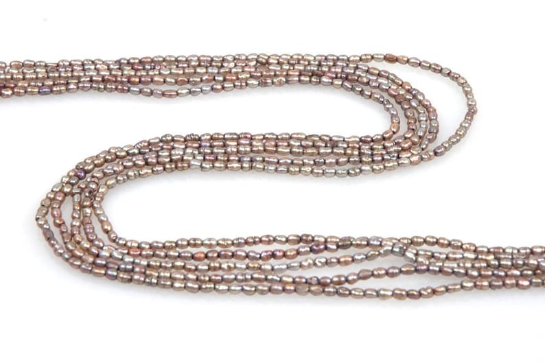 Dyed Chinese freshwater banded rice pearls