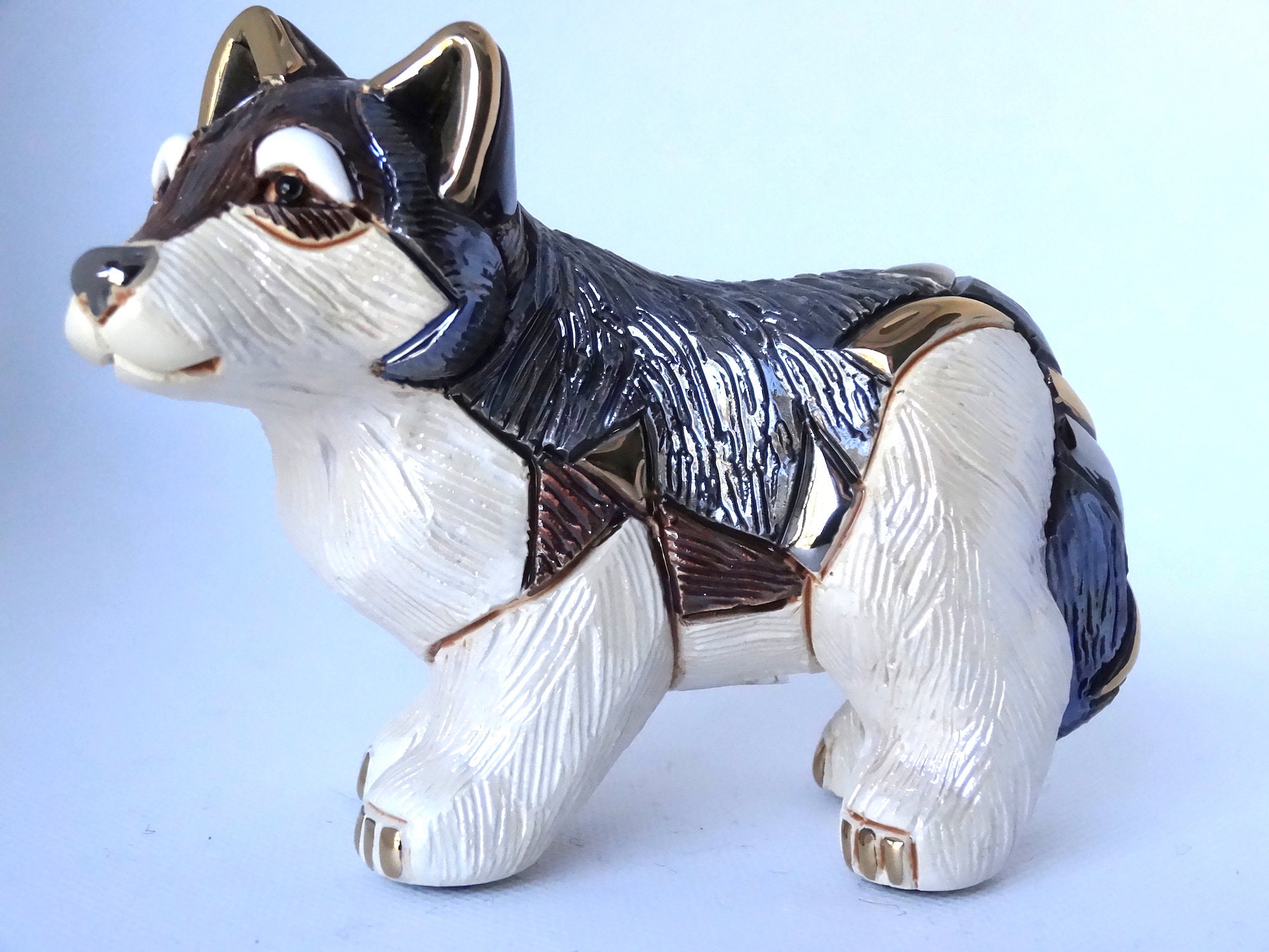 ceramic wolf statue
