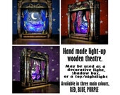 A beautiful handmade wooden light-up theatre lamp in art deco vintage style. Use as a shadow box, a book nook, a nightlight, or a toy.