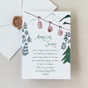 May include: A white invitation card with a hand-drawn illustration of a ski lift with red cabins against a snowy mountain backdrop. The text reads "Apr&eacute;s Ski Soir&eacute;e" and includes details about the event, including the date, time, and location.