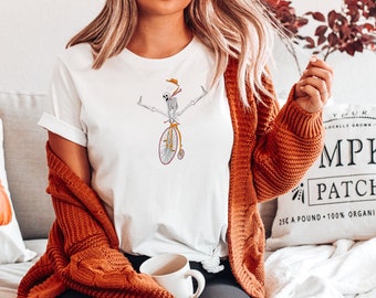 Grappig schattig skelet rijden op een fiets Tshirt | Halloween Spooky Seizoen Gezellig Seizoen Top Herfst Herfst Humor Oversized Esthetische Oranje Unisex