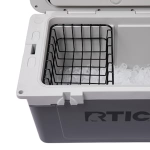 May include: A gray and white cooler with a black wire basket and ice. The cooler has a two-tone design with a gray base and a white lid and interior. The black wire basket is positioned inside the cooler, and ice cubes fill the bottom.