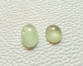 Natuurlijke aquamarijn 2 stuks ovale cabochon edelsteen 8,50 x 13,50 mm en 8 x 10 mm. Natuurlijk melkachtig aquamarijn. Aquamarijn voor sieraden.