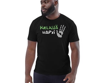 May include: Black t-shirt with the text "KELKUA HAPXI" in green and white, along with a gray handprint graphic. The shirt is made of a soft material.