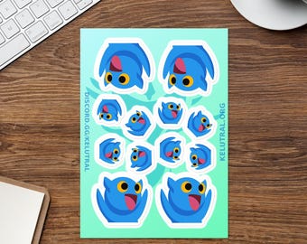 May include: Sheet of stickers featuring blue cartoon bats with yellow eyes and pink tongues. The stickers have a white border and are on a light green background. The text "DISCORD.GG/KELUTRAL" and "KELUTRAL.ORG" are printed on the sheet.
