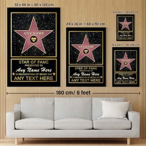 Op de afbeelding: Een aanpasbare Hollywood Walk of Fame-sterplaquette met een roze ster en gouden letters. De plaquette heeft de tekst "Star of Fame Presented to Any Name Here In Recognition of Being the Any Text Here". De plaquette is verkrijgbaar in drie maten: 80 x 120 cm, 60 x 90 cm en 40 x 60 cm.