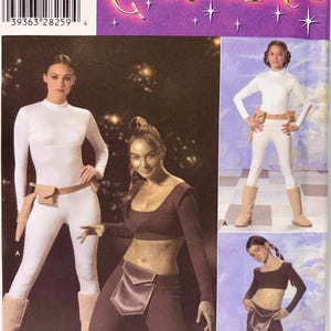 May include: Simplicity Costumes pattern 4433 for sizes S-L/XS-L. The package displays two costume variations: a white long-sleeve bodysuit with a tan utility belt and boots, and a dark brown long-sleeve crop top with matching leggings and a hip flap.
