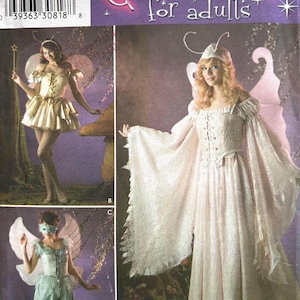 May include: Simplicity costume pattern for adults. The image shows three different fairy costumes. The costumes include wings, dresses, and accessories. The pattern includes sizes 6, 8, 10, and 12. The text "Costumes for adults" is visible.