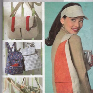 May include: A sewing pattern showing different bag designs. The bags include a beige messenger bag with red accents, a floral backpack, a striped tote, and a floral print shoulder bag. The pattern is labelled "B4147 Butterick".