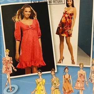 May include: Simplicity sewing pattern number 2951, inspired by Project Runway, for sizes 12-20. The pattern includes instructions for making five different dresses, including a red dress with a ruffled hem, a floral print dress, and a yellow dress with a bow.