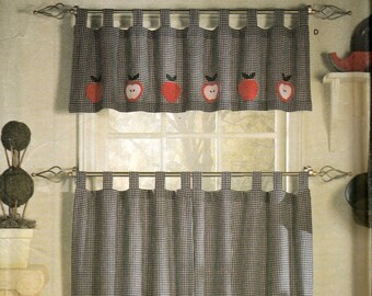 May include: A Simplicity Home sewing pattern for a 6-pack of appliqued curtains. The curtains are black and white gingham with red apple appliques. The pattern includes instructions for making both a valance and a tier.