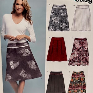 May include: A New Look sewing pattern showcasing different skirt designs. The image displays a woman wearing a floral skirt, and several skirt styles are shown, including pleated and patterned options. The pattern includes sizes 8-15.