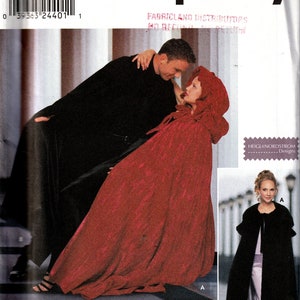 May include: Simplicity sewing pattern number 9452 for a hooded cape. The pattern includes two designs, one with a red cape and one with a black cape. The pattern is for sizes small, medium, and large.