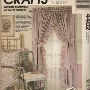 May include: A sewing pattern for window treatments, featuring a pair of ruffled curtains in a soft pink colour. The pattern is titled "Window Essentials" and "De Jolies Fenêtres" and includes instructions for making curtains, drapes, and valances.