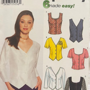 May include: A Simplicity 9763 sewing pattern envelope featuring illustrations of various button-down tops and vests. The designs include a floral print sleeveless top, a yellow top with a rose detail, a red gingham top, and a solid black long-sleeve top.