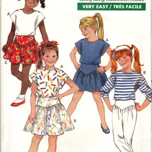May include: A sewing pattern for children's clothing. The pattern includes instructions for making a white top with a red and white skirt, a white top with a colorful skirt, a blue top with a blue skirt, and a striped top with white pants. The pattern is labeled "Butterick 6354" and is for sizes 2-3-4.
