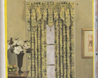 May include: A sewing pattern for curtains with a floral print. The pattern includes instructions for making a valance, curtains, and tiebacks. The pattern number is 7075.