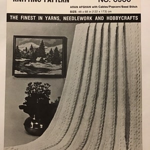 Mary Maxim Knitting Pattern No. 6900 - Aran Afghan with Cables, Popcorn, See stitch - Size 48 x 68” (122 x 173 cm)