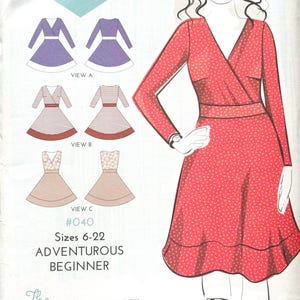 May include: A sewing pattern for "The Lena Wrap Dress", featuring dress illustrations and sleeve options. Sizes 6-22 are included, suitable for beginners. The main image displays a red polka dot wrap dress. The pattern is for a stylish surplice dress.