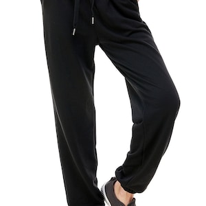 Women's High Waisted Sporty Gym Athletic Fit Jogger Sweatpants and Loose fit Lounge Trousers