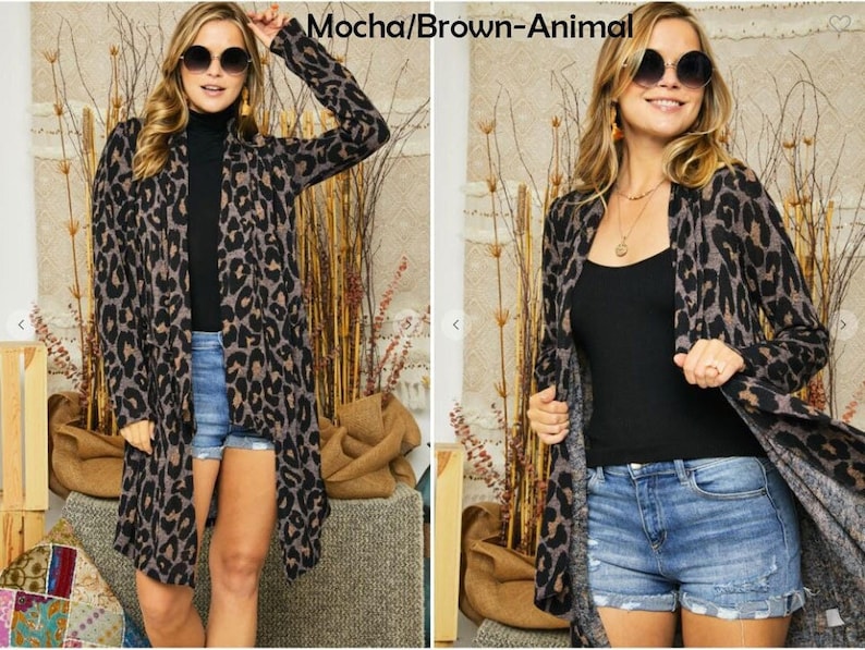 Two views of a blonde model wearing a brown animal print cardigan, black top, and denim shorts, with the text mocha brown animal above.