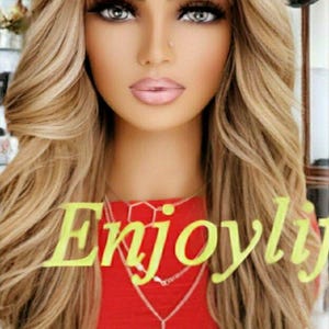 Balayage highlighted golden honey blonde with light blonde highlights wavy lace front h.d wig