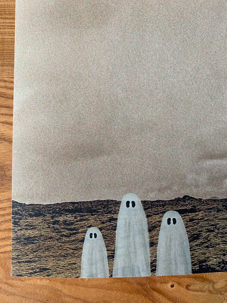 May include: Three white ghosts with black eyes stand in front of a dark, textured background.